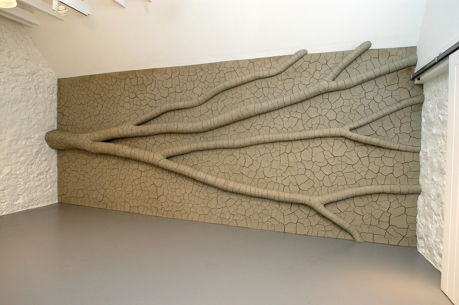 Andy Goldsworthy, Wall with Clay Tree, 2009, photograph by Allan Pollok Morris, courtesy of Jupiter Artland